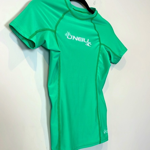 O'Neill Women's Size XS Short Sleeve Rashguard Green White UPF 50 - Picture 6 of 7